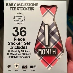 Baby milestone ties. Never used!